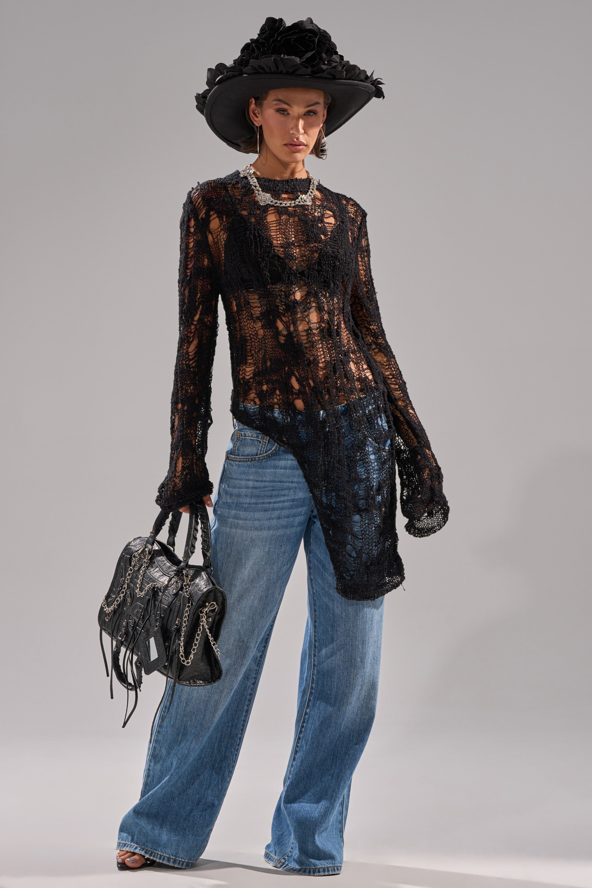 ASYMMETRICAL KNIT SWEATER